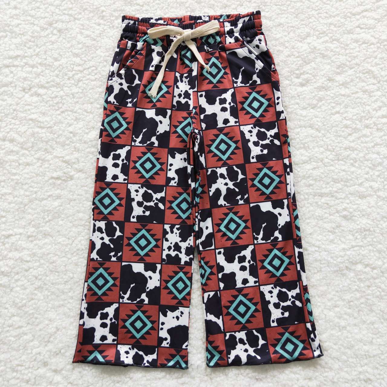 P0140 Geometric plaid pants in cow print