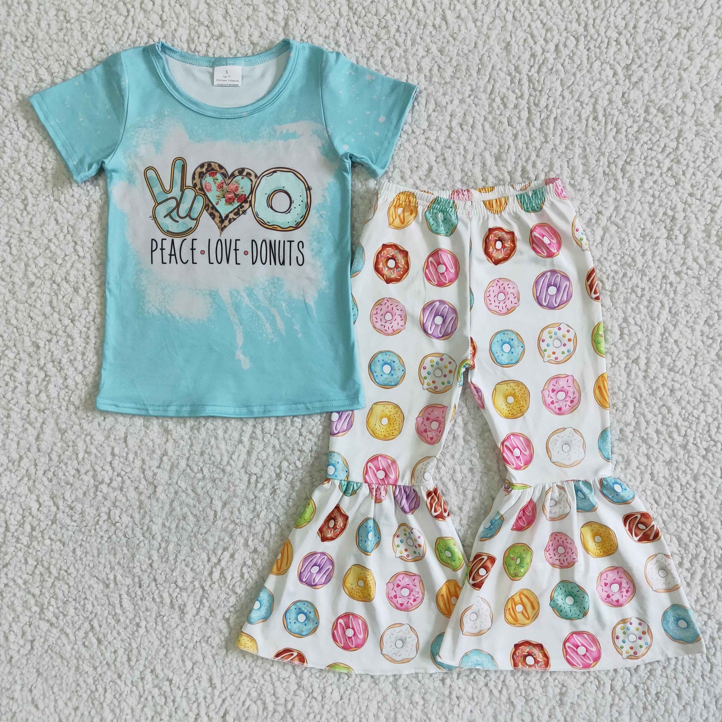 A14-4 Blue short-sleeved top with donut-print flared pants