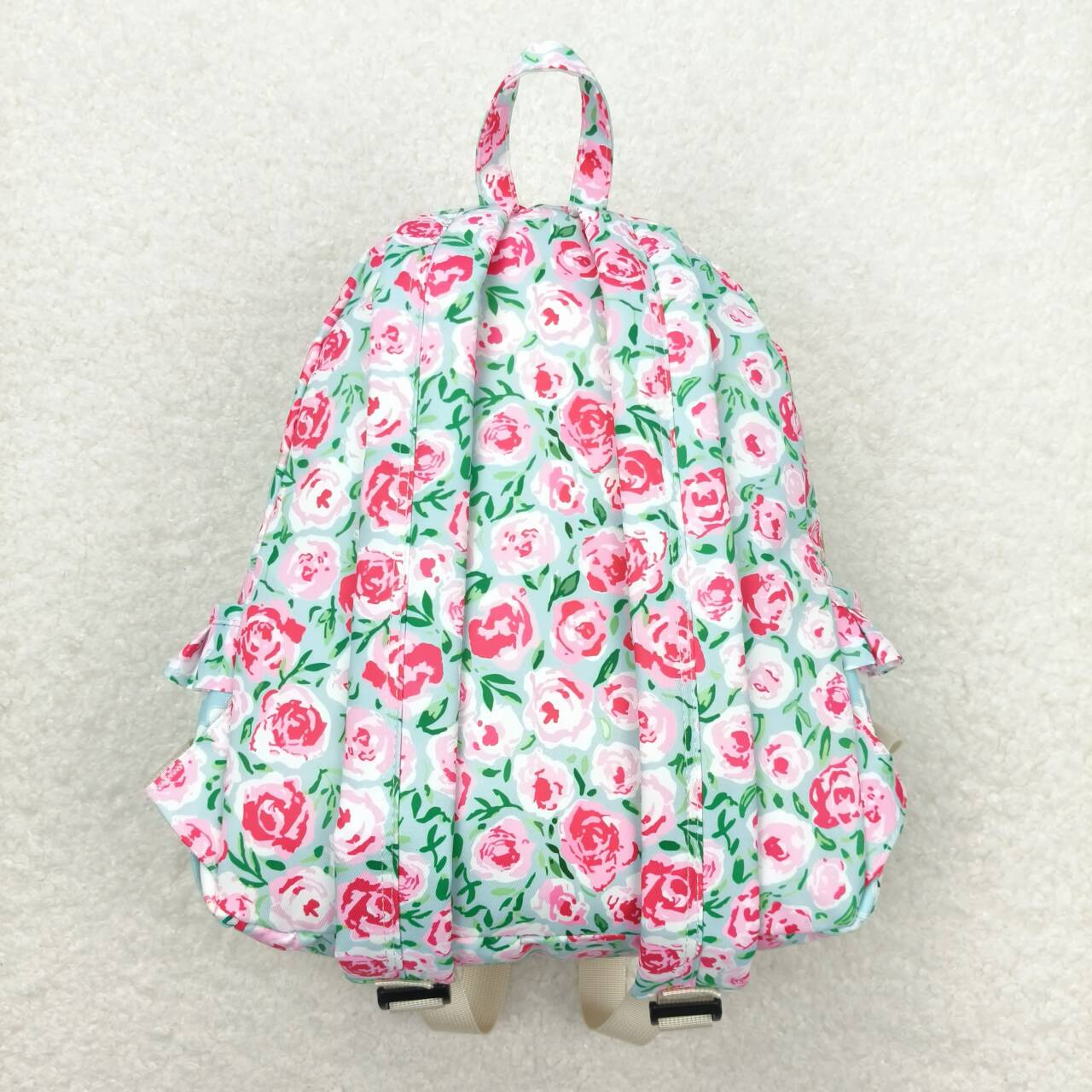 BA0100 Pink flowers light blue backpack