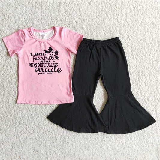 B8-15 Pink lettered short-sleeved top with black flared pants