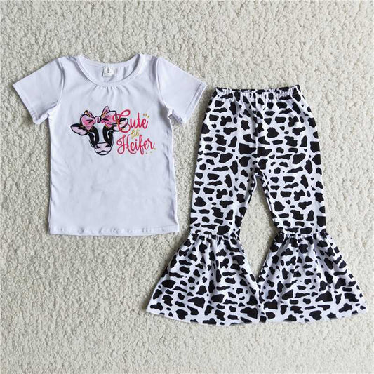 B4-21 Cow print short-sleeved top with bow and cow-spot flared trousers