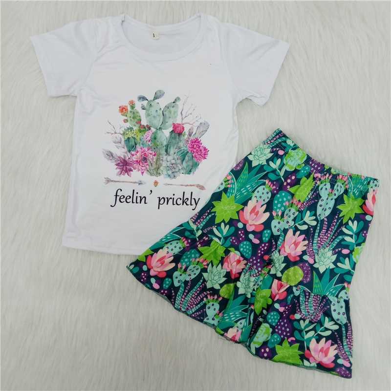 B12-9   Cactus-print white short-sleeve top with printed green shorts