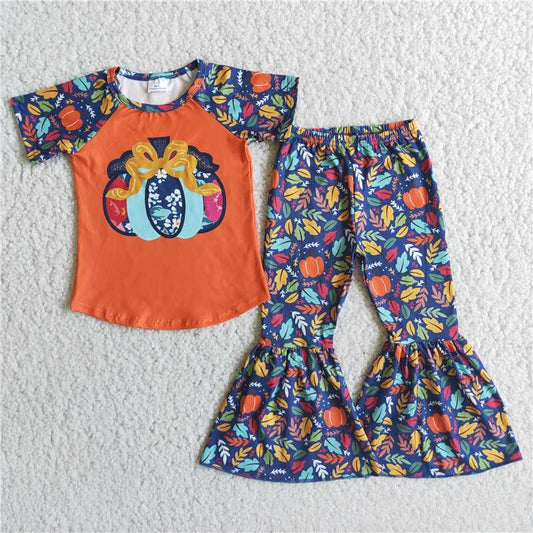 E1-3  Pumpkin-print orange short-sleeve top with colorful print flared pants