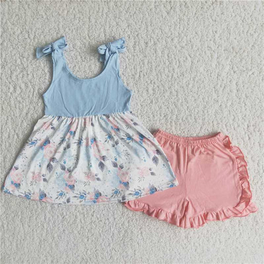 C0-12   Flower-patterned blue lace-up sleeveless top with pink shorts