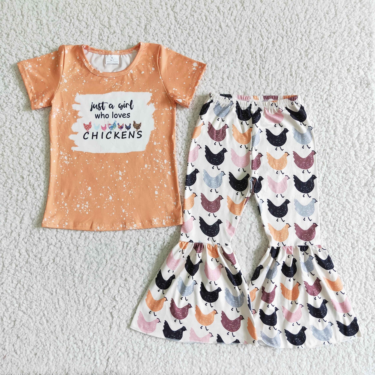 A2-9   Yellow Lettering Short Sleeve Top with Chicken Graphic Print Flared Pants