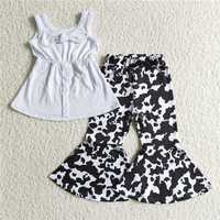 A18-4 White Sleeveless Top withcow pattern flared trousers